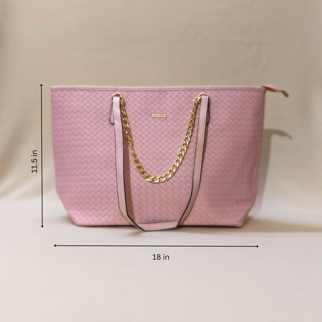 Pink handbag with gold chain strap and measurements on a beige background