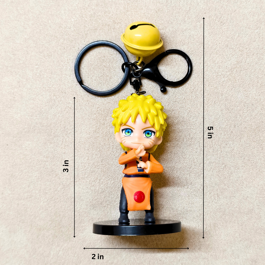 Keychain with character figure and bell, shown with measurements on a neutral background