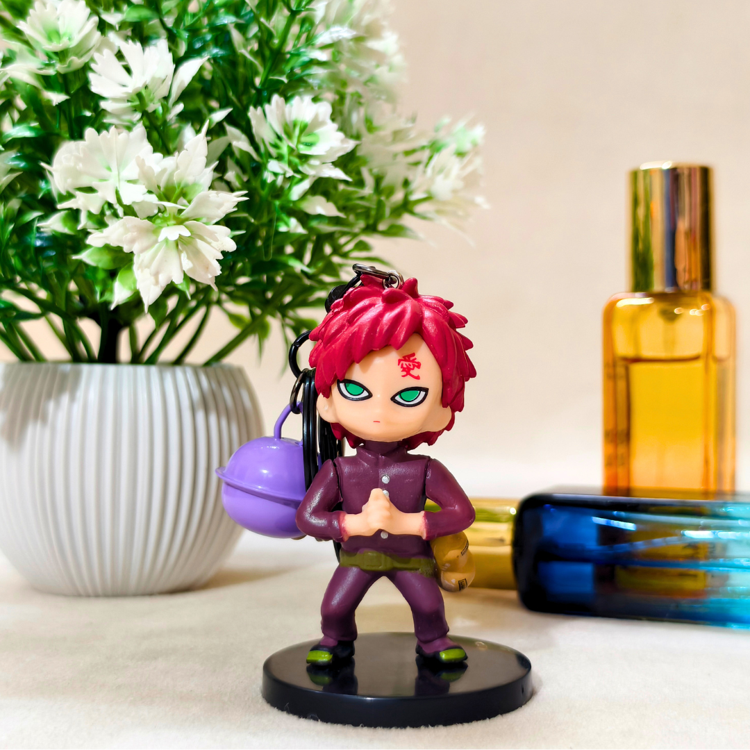 Small figurine with pink hair and purple outfit on a surface with a plant and bottles in the background